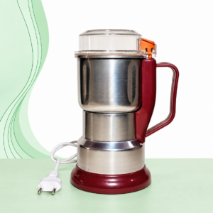Silver and maroon electric spice grinder with a transparent lid, side handle and white power cord on a green wave background.