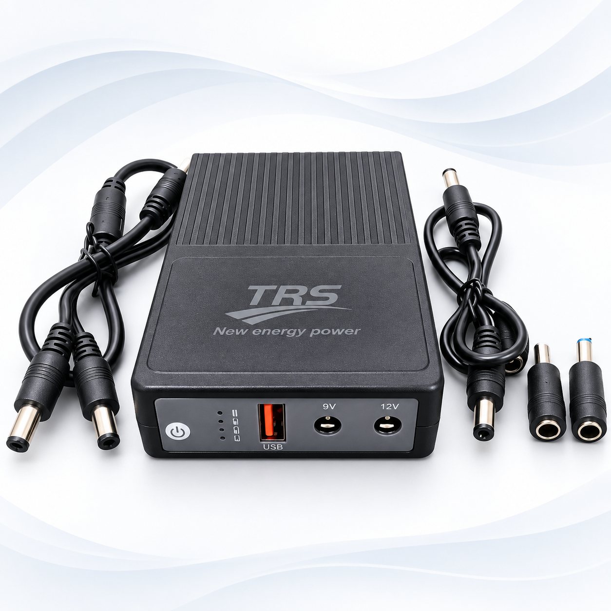 Black Mini DC UPS with USB, 9V and 12V output ports, LED indicators, DC cables and connector adapters.